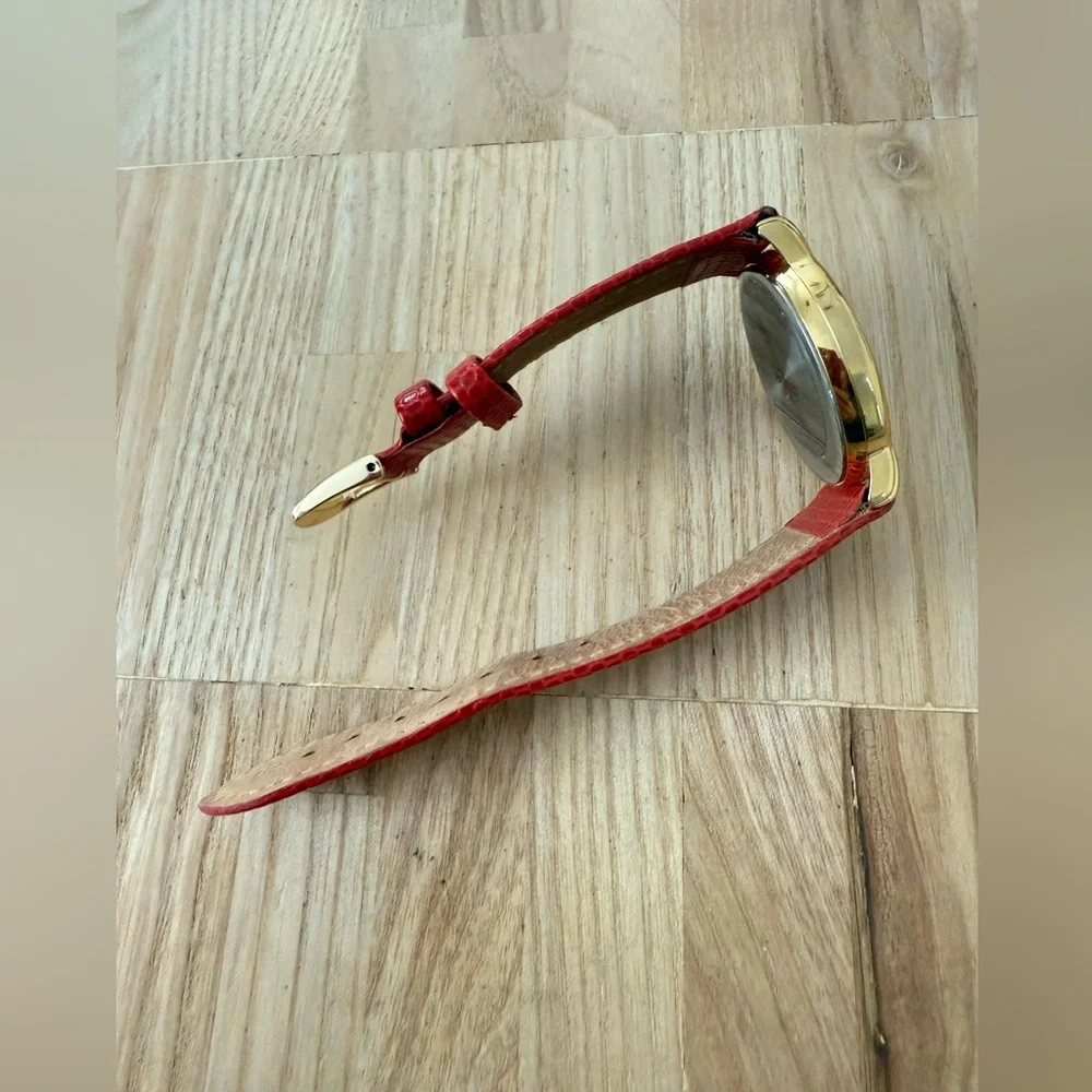 Bulova gold tone red leather watch NEW BATTERY